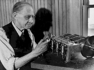 Taylor with a scale model of his engine in 1947 (author unknown)